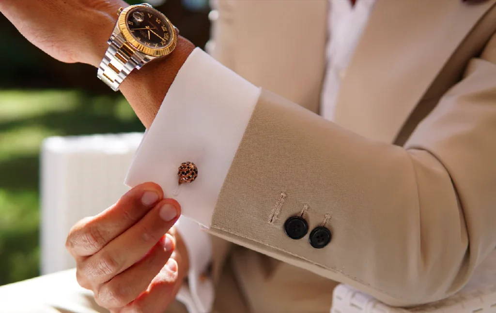 How do you properly attach and wear cufflinks on shirts
